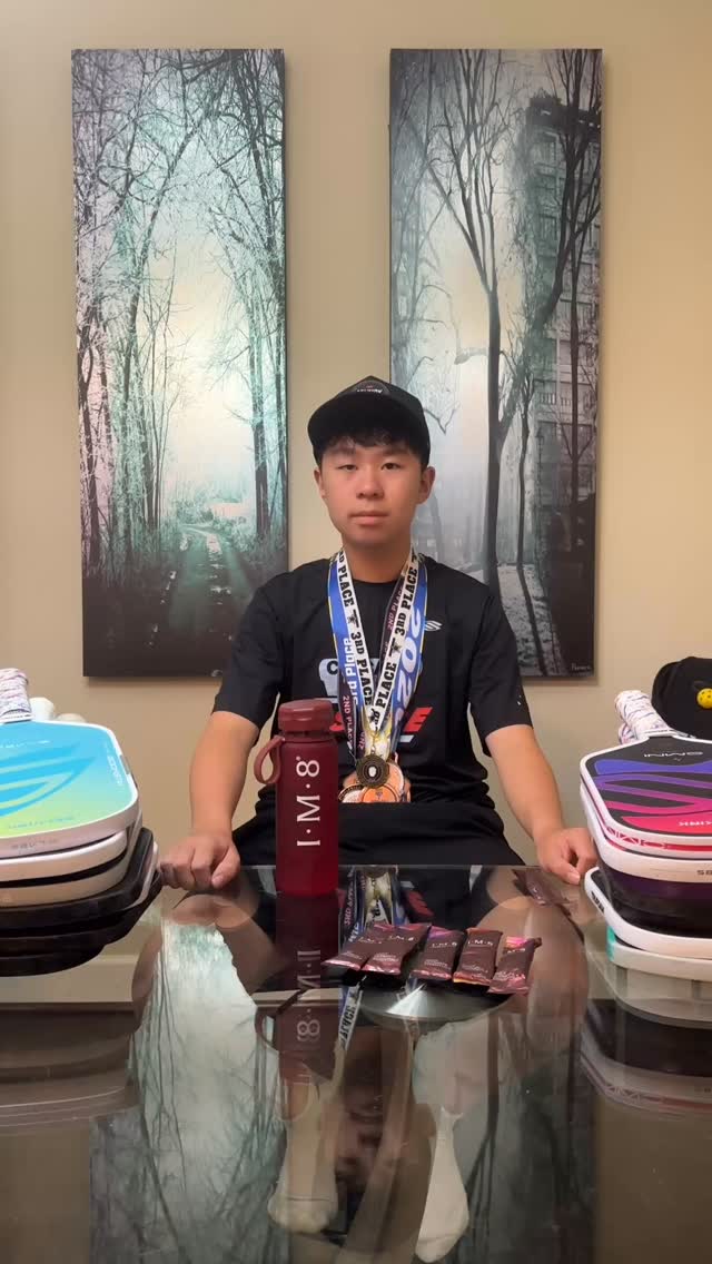 IM8 ad: The medals are mine. The IM8 is Dad’s. 😄🏅🏓 My dad and I play a lot of pickleball tournaments together, and lately IM8 has become part of 