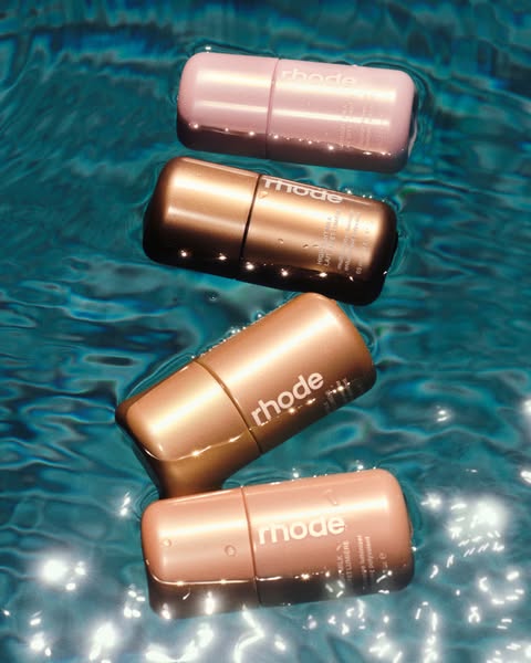 rhode ad: meet highlight milk 🌟 our tried-and-true glazing milk formula infused with soft pearl for a hydrated, radiant finish. ​